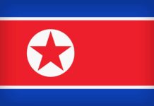 Ja dhe Sistemi Operativ Ylli i Kuq Flamuri i Korese veriut me ngjyre kuq e blu dhe me yll te kuq ne sfond te bardhe
